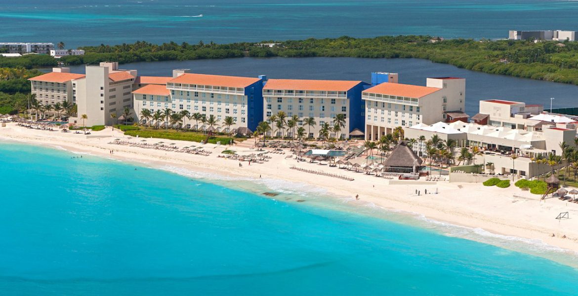 aerial-view-beach-resort-turquoise-water-white-sand