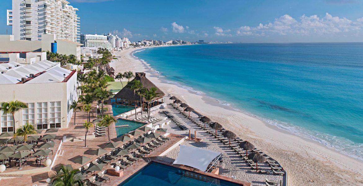 aerial-view-beach-resort-turquoise-water-white-sand