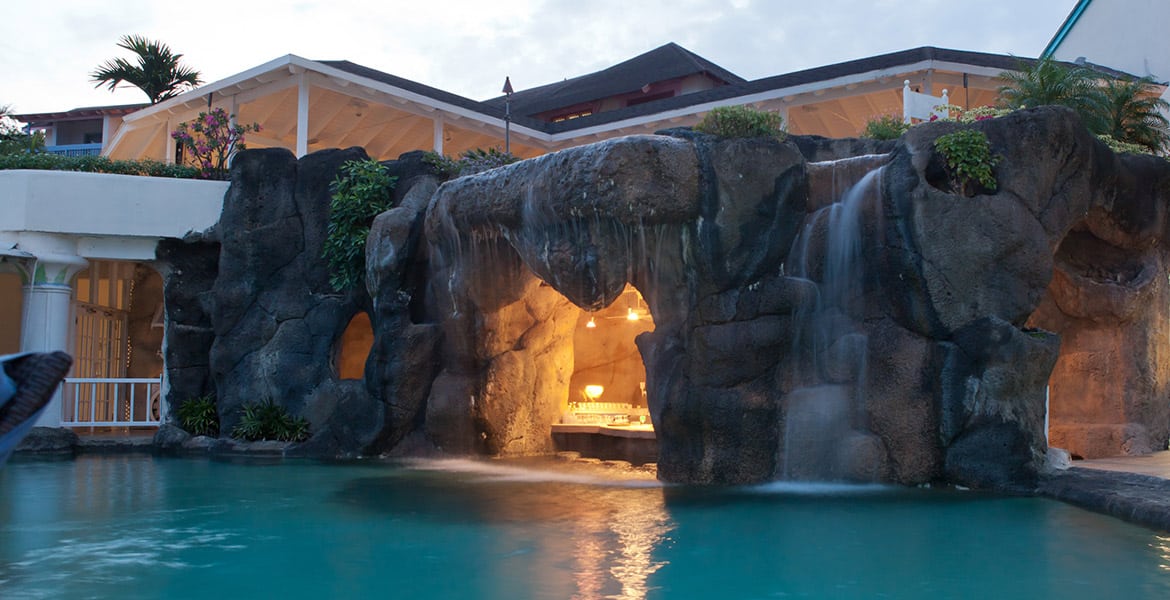 pool-waterfall-Crystal-Cove-by-Elegant-Hotels