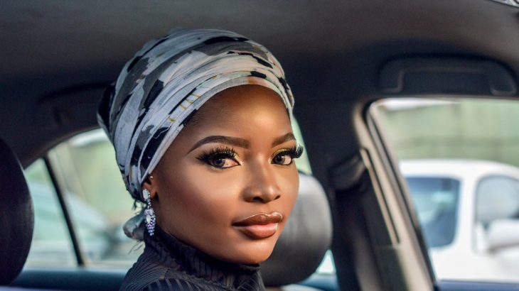 woman-sitting-in-car-big-eyelashes