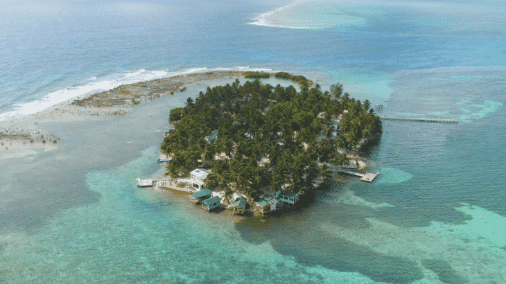 Aerial view of island with tiny cottages on it
