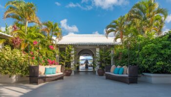 courtyard of Spice Island Beach Resort looking out onto ocean