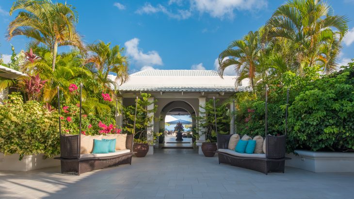 courtyard of Spice Island Beach Resort looking out onto ocean