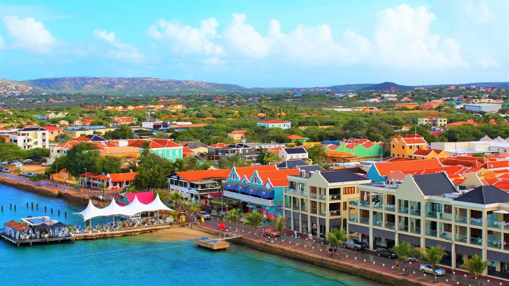 An above shot of Bonaire with colorful shops and restaurants on the oceanfront