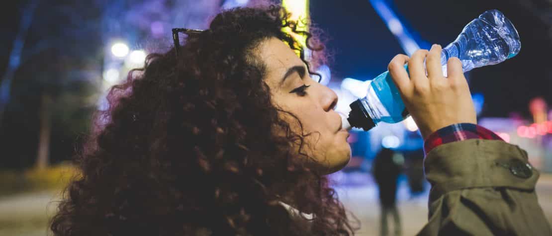 woman-drinking-plastic-water-bottle