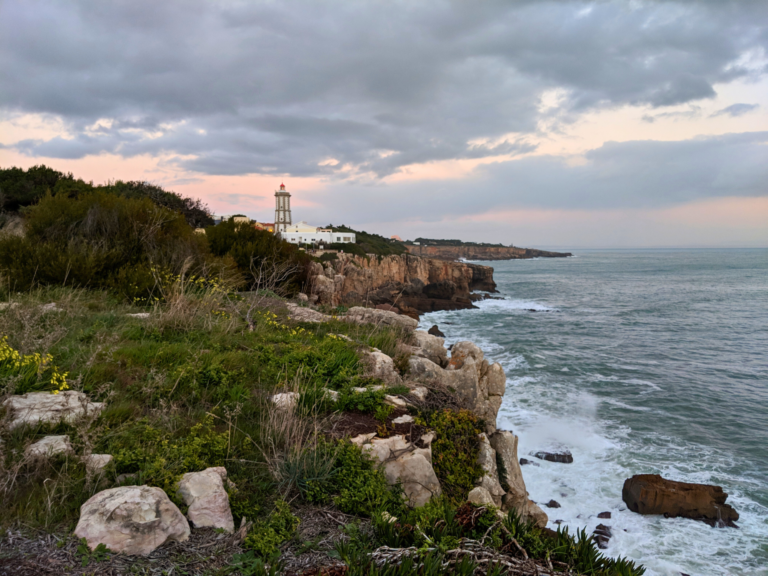 Cliffside in Cascais with lighthouse
