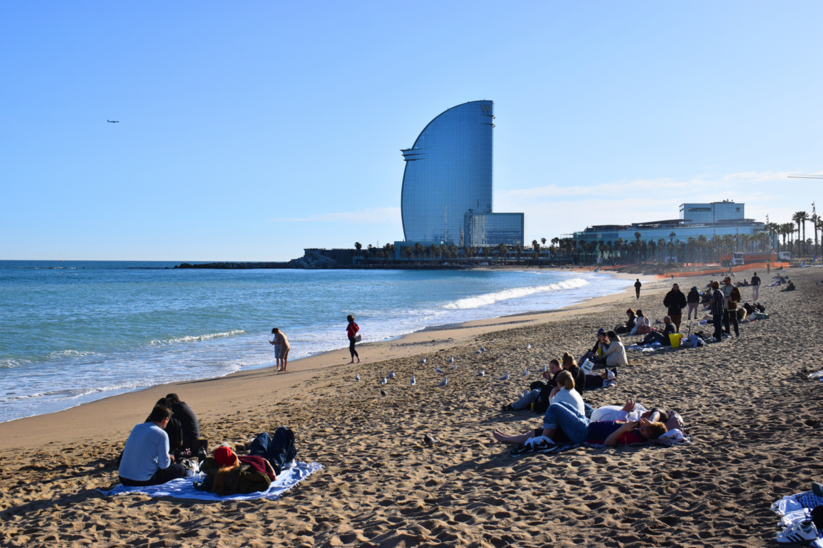 People gather on Sant Miquel beach