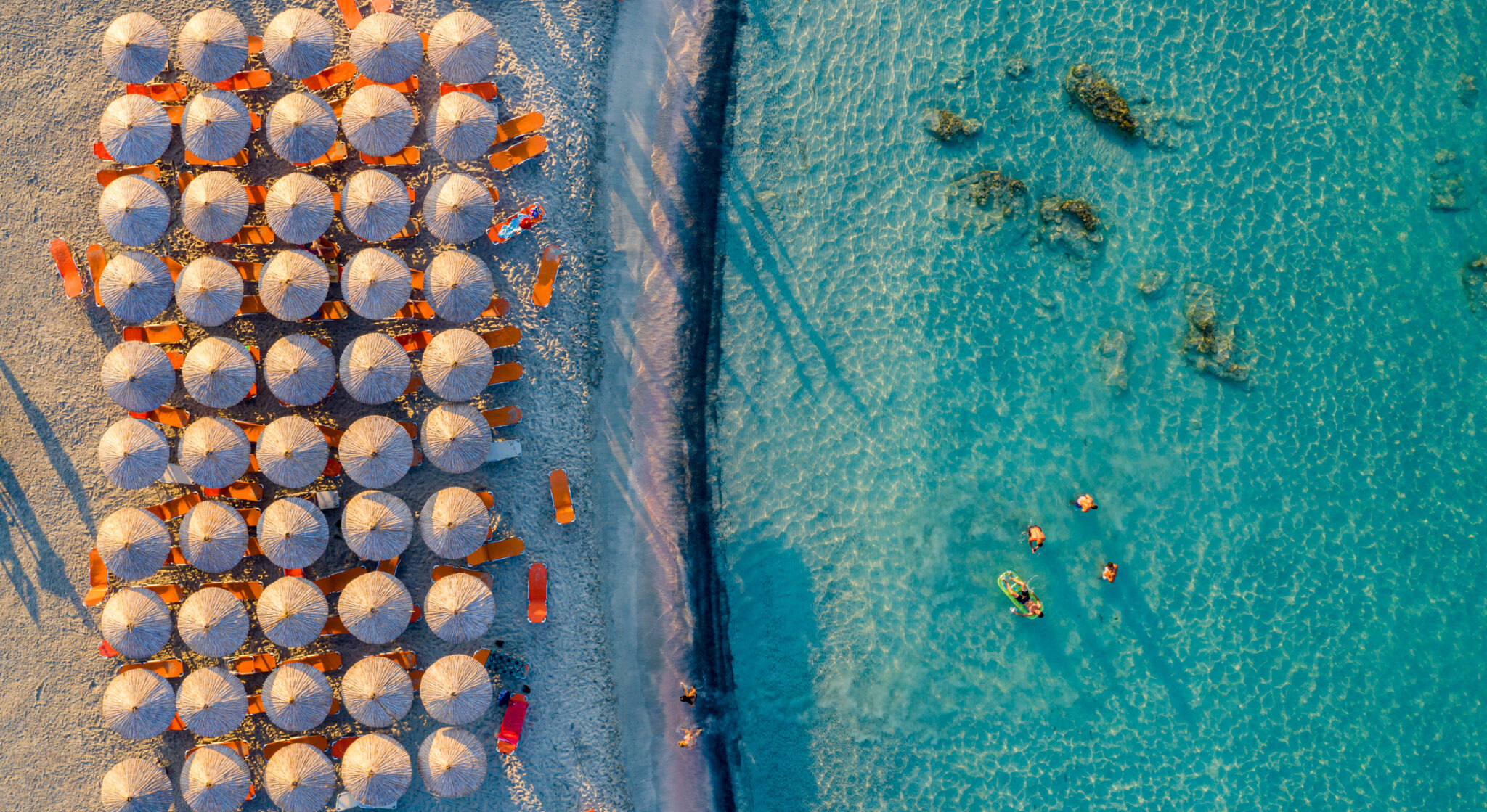Turquoise Waters & Pink Sand—The World’s Best Beach Is in Greece, Not the Caribbean