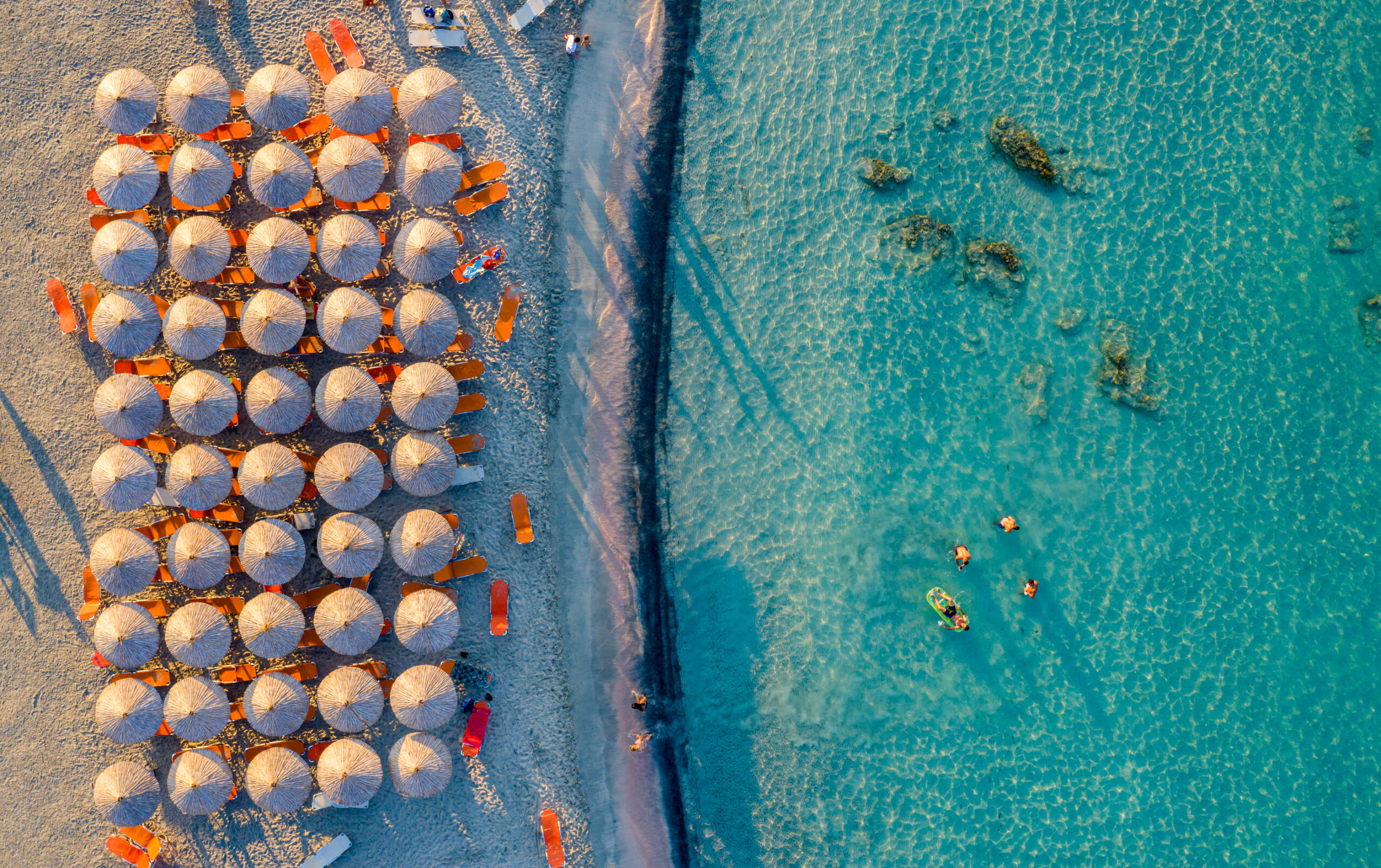 Turquoise Waters & Pink Sand—The World’s Best Beach Is in Greece, Not the Caribbean