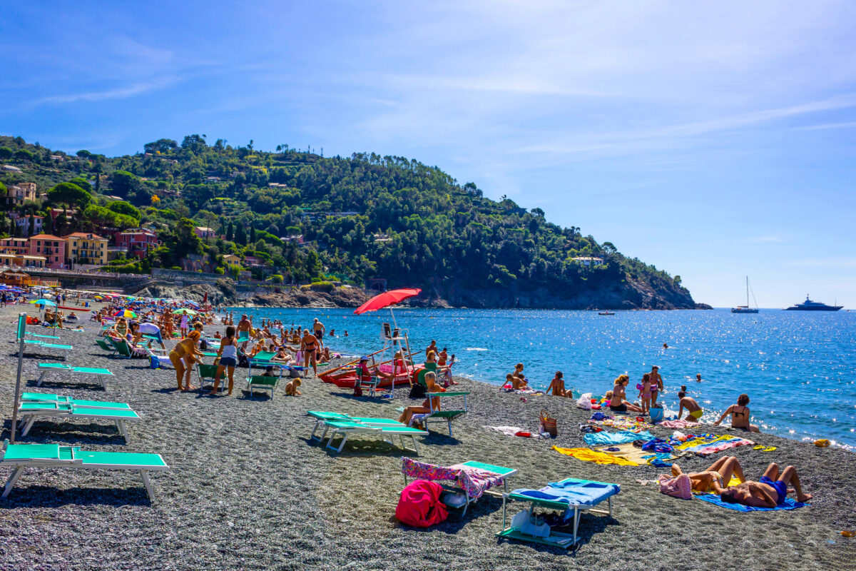 people gather on Bonassola beach