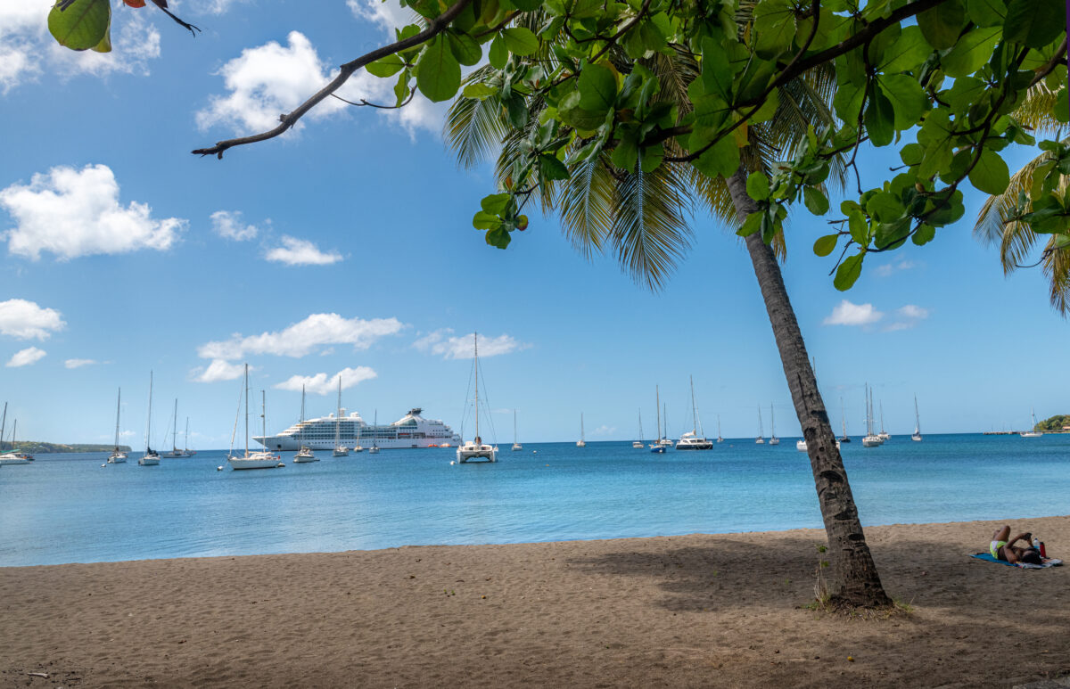 boats in the water at Purple Turtle Beach, Dominica