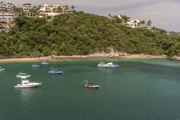 Buildings and boats in Santa Cruz Huatulco Mexico.