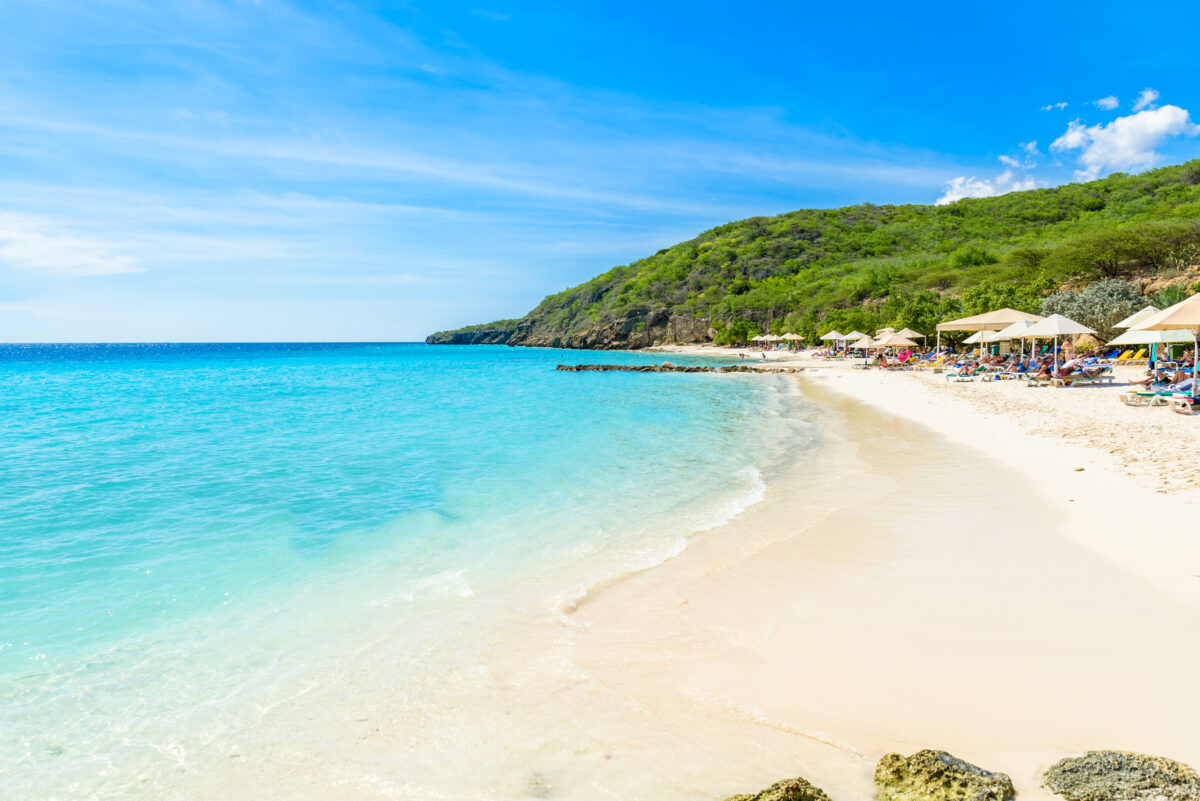 Porto Marie beach - white sand Beach with blue sky and crystal clear blue water in Curacao, Netherlands Antilles, a Caribbean Island
