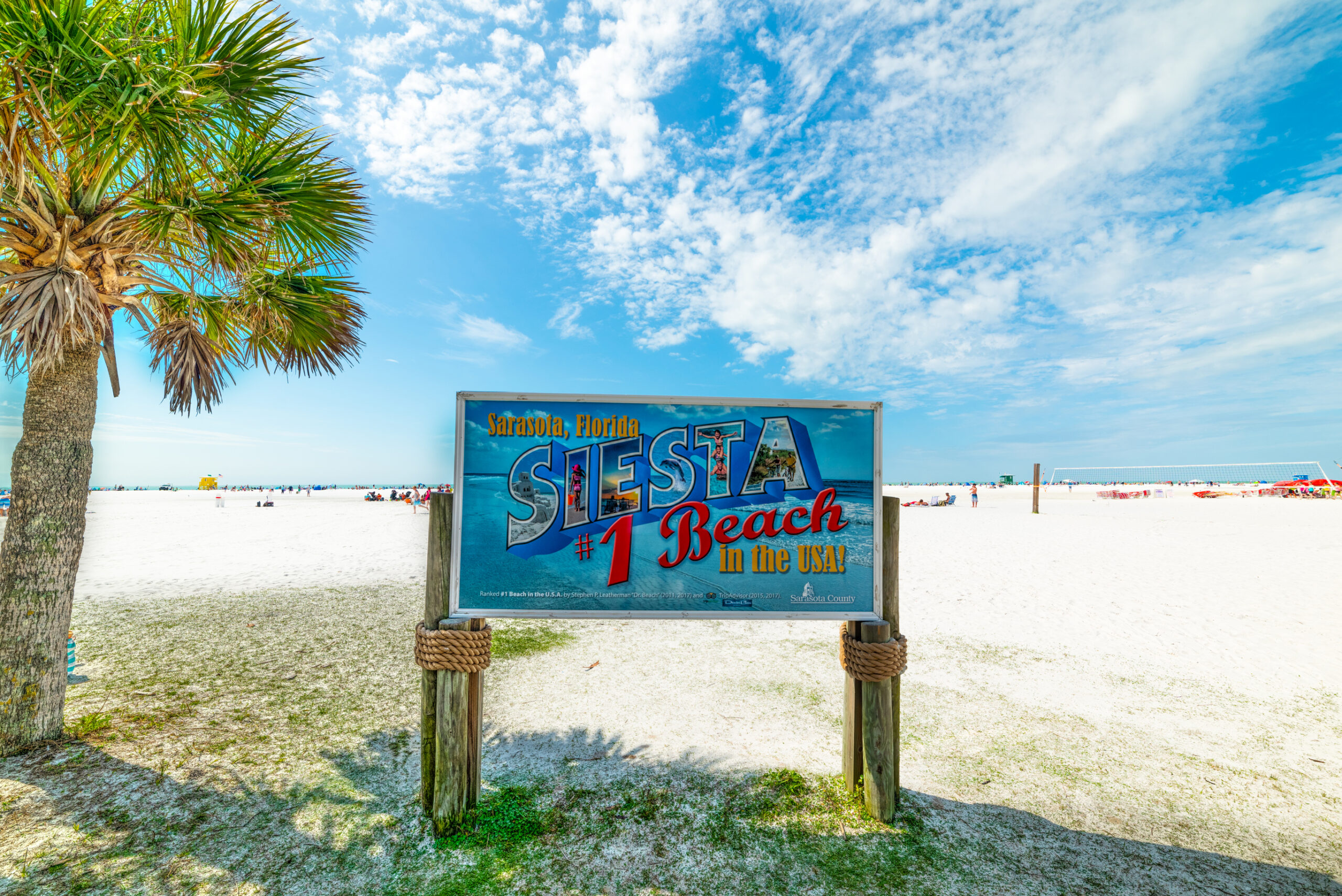 Siesta Beach sign on a clear day