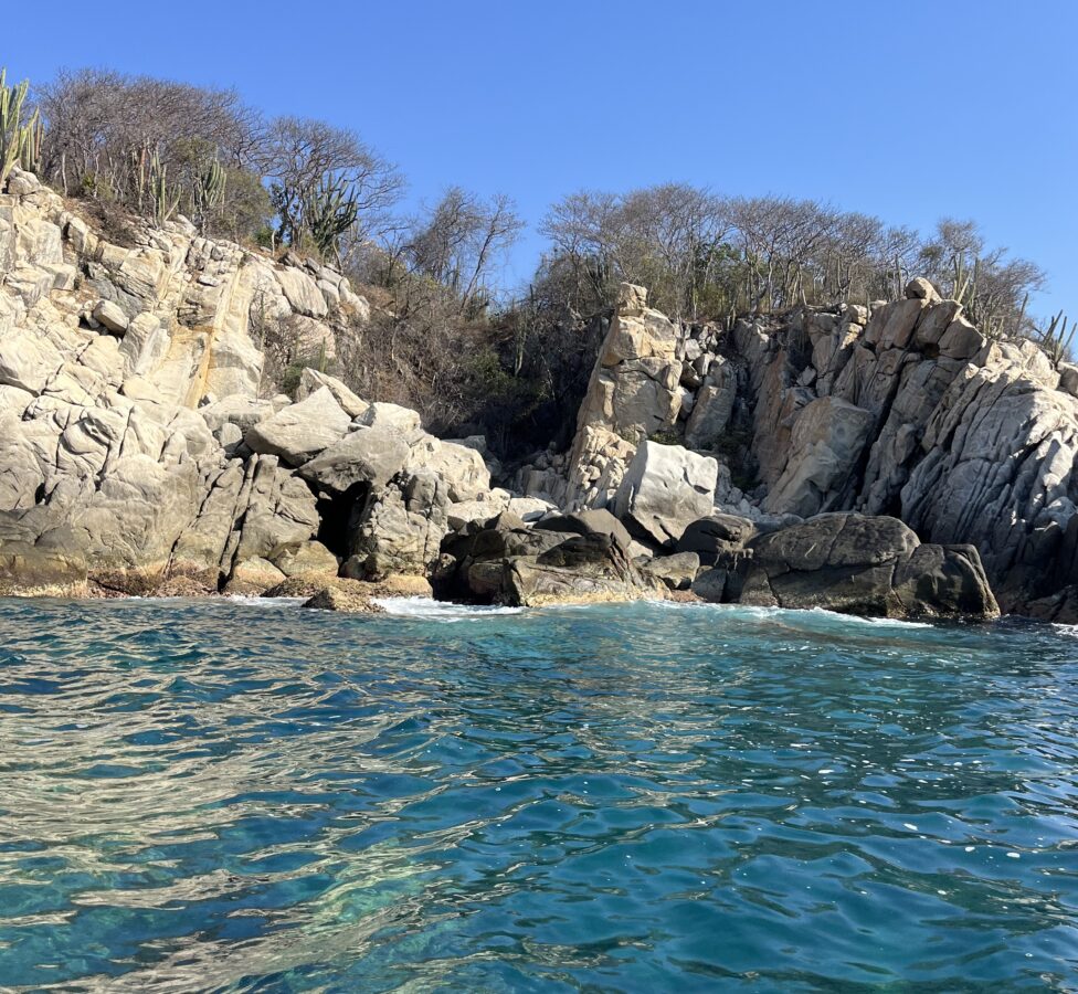 Clear, blue waters of Playa angelito beach in Oaxaca.