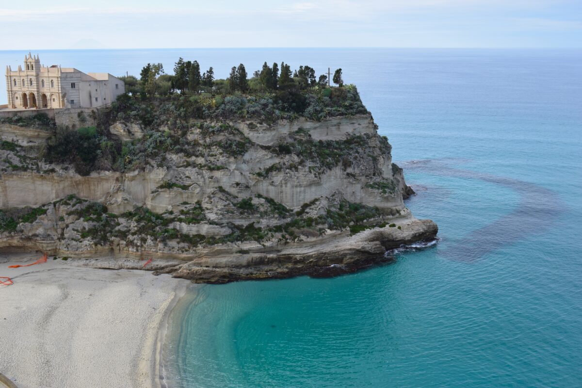 clear water and rocky backdrop at Rotonda Beach, Italy