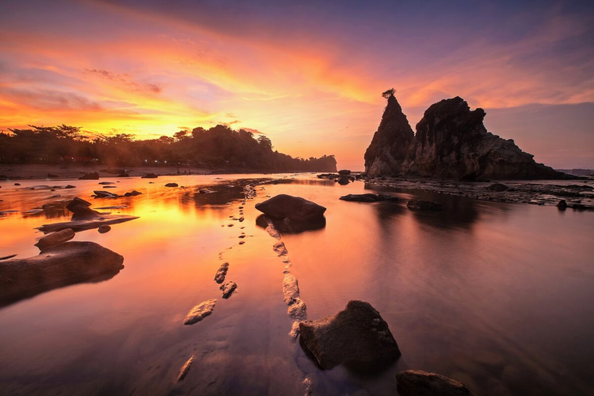Beautiful clouds Sunrise at Tanjung Layar Sawarna Beach Bayah Banten West Java Indonesia.