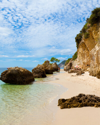 This Charming Beach Town in Portugal Has Dolphin Cruises, National Park Beaches, and Legendary Fried Seafood