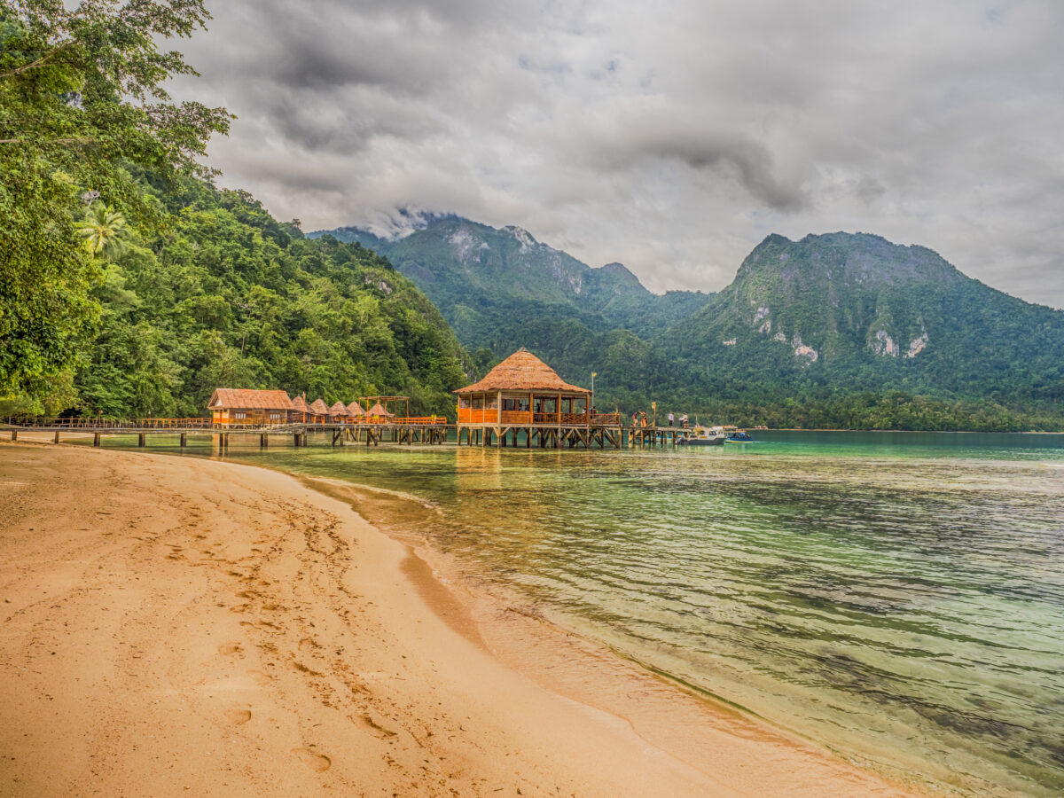 Houses on the water in Ora Beach Resort, Seram Island, Central Maluku, Indonesia.