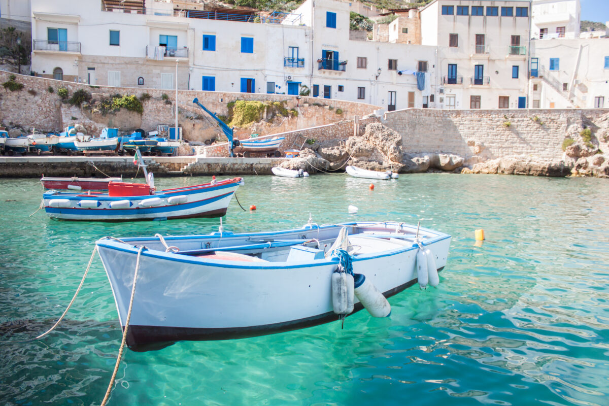 Fishing boats near a pier at Levanzo island, Sicily.
