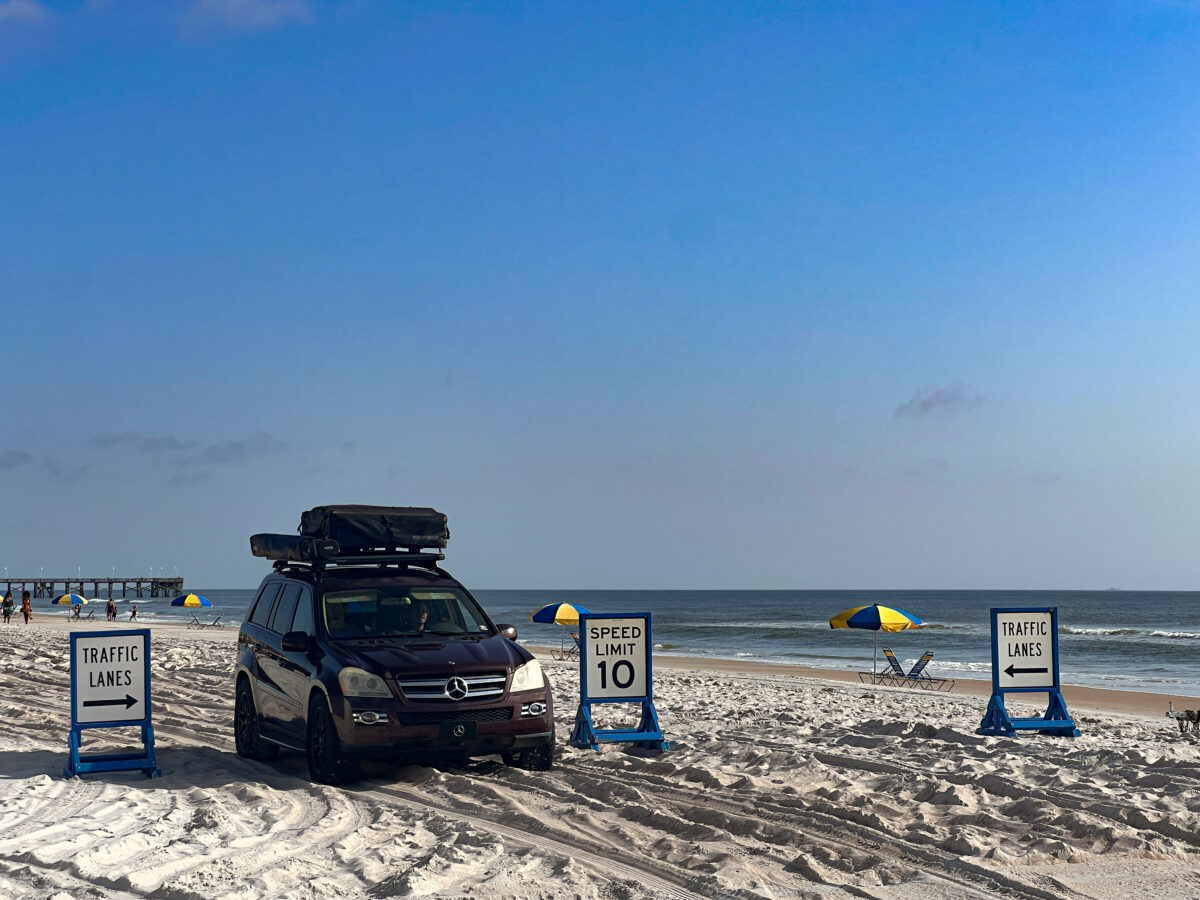 Car driving on the beach in Daytona Beach.