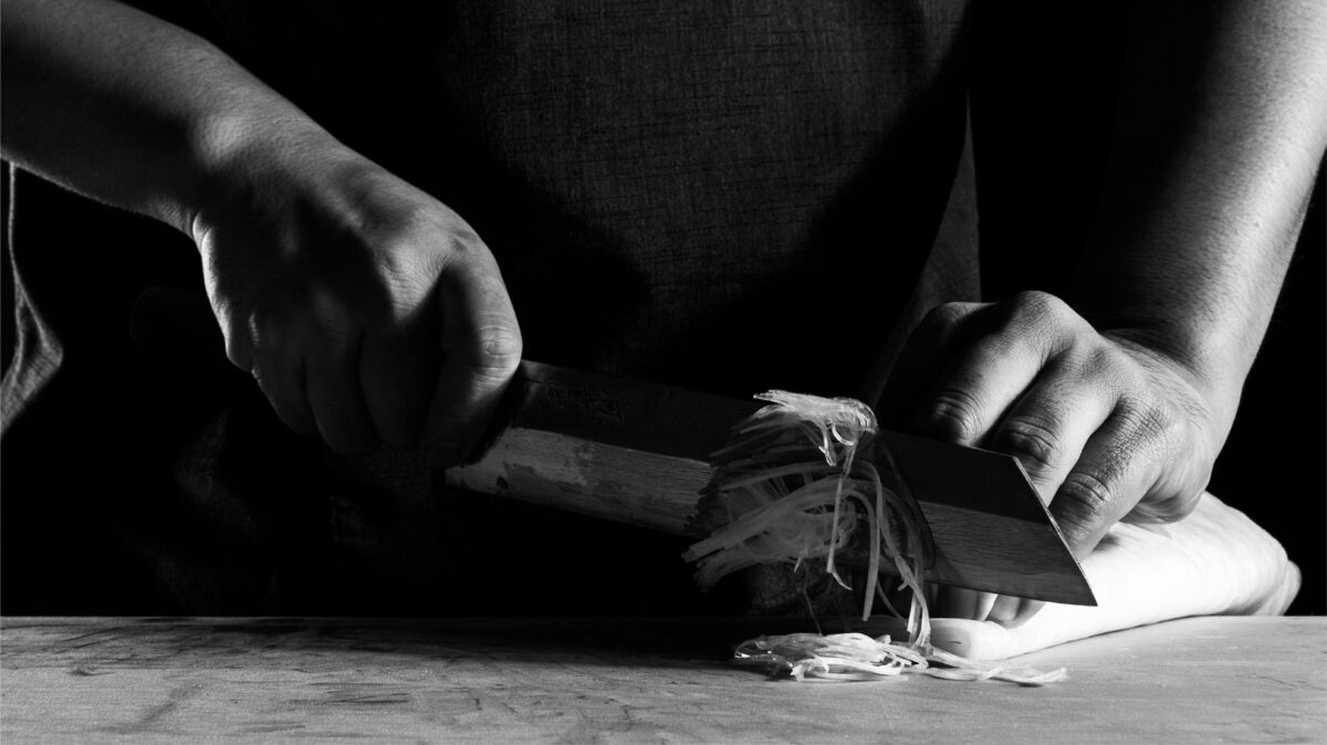 chef chopping ingredients at Hiden, Miami