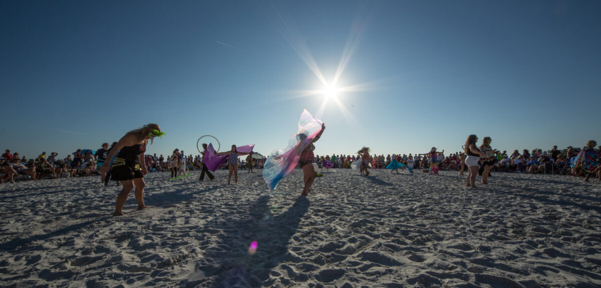 Dancing on the Beach at Siesta Key Florida to drumming circle.