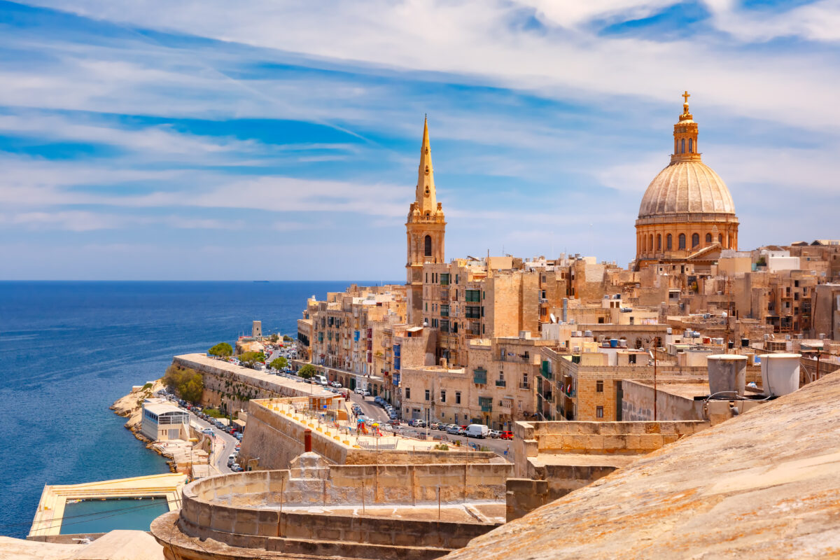 View from above of roofs and church of Our Lady of Mount Carmel and St. Paul`s Anglican Pro-Cathedral, Valletta, Capital city of Malta