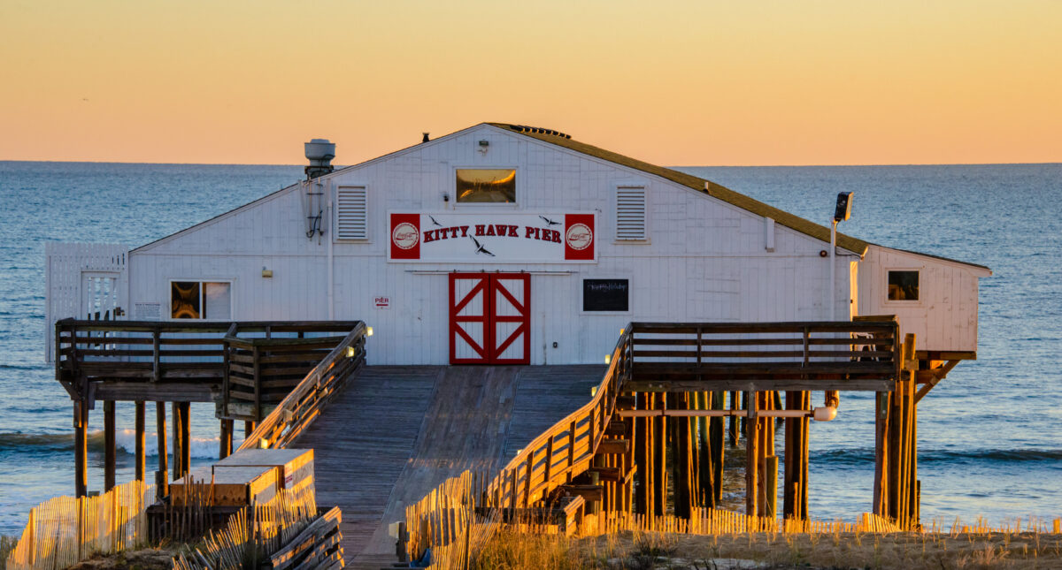 Photograph of Kitty Hawk Pier in morning light at Kitty Hawk, Outer Banks, NC.