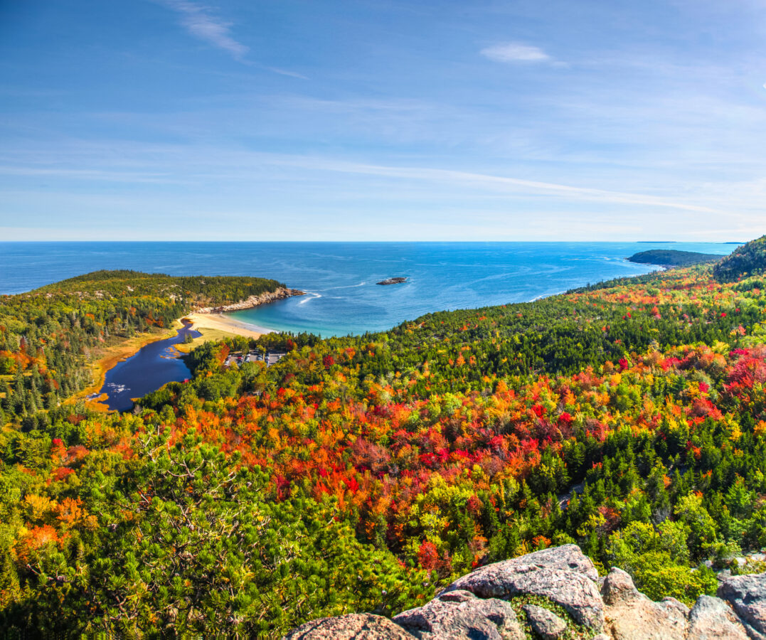 Panoramic view of the stunning fall colors and blue waters of the Bay in Acadia National Park.