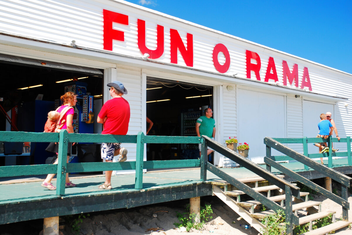 People gather outside Fun O Rama, an arcade on the beach in Maine.