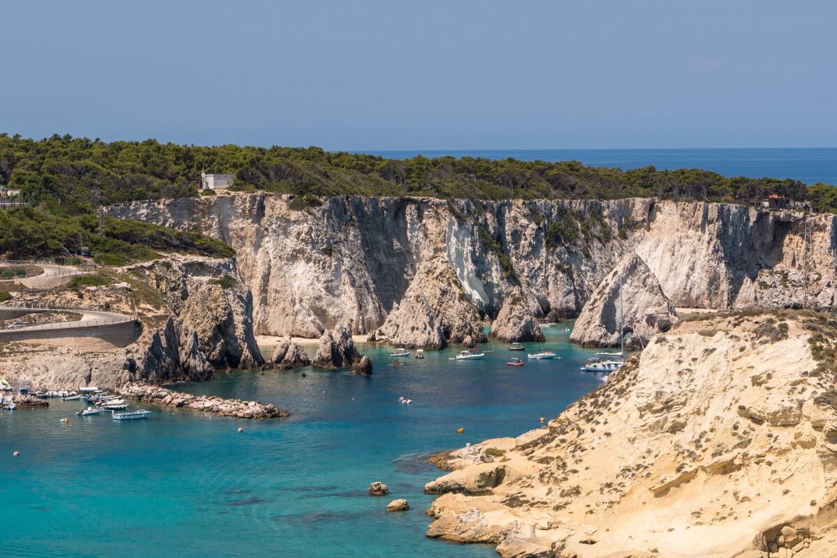 The rock and cobalt blue sea of San Domino Island on the archipelago of the tremiti islands in Puglia, Gargano, Italy.