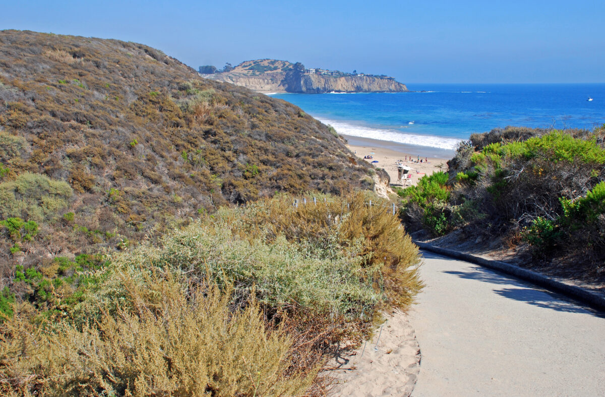Walkway through Crystal Cove State Park to Beach.