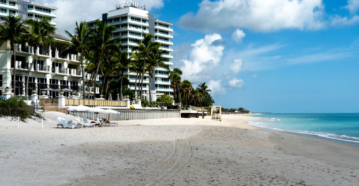 Back of Vero Beach Hotel showing sand and water.