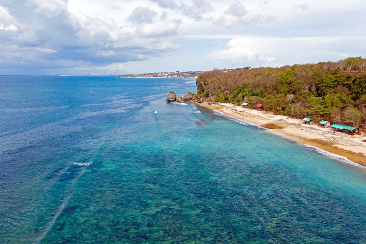 Aerial at Thomas Beach in Uluwatu area on Bali in Indonesia.
