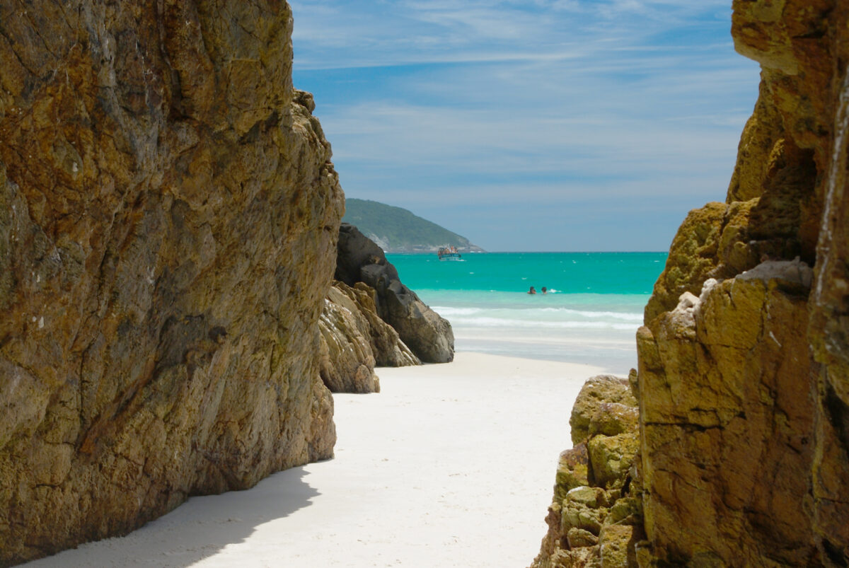 Cave in the rocks in a Crystalline clear waters in Arraial do Cabo, Rio de Janeiro, Brazil.
