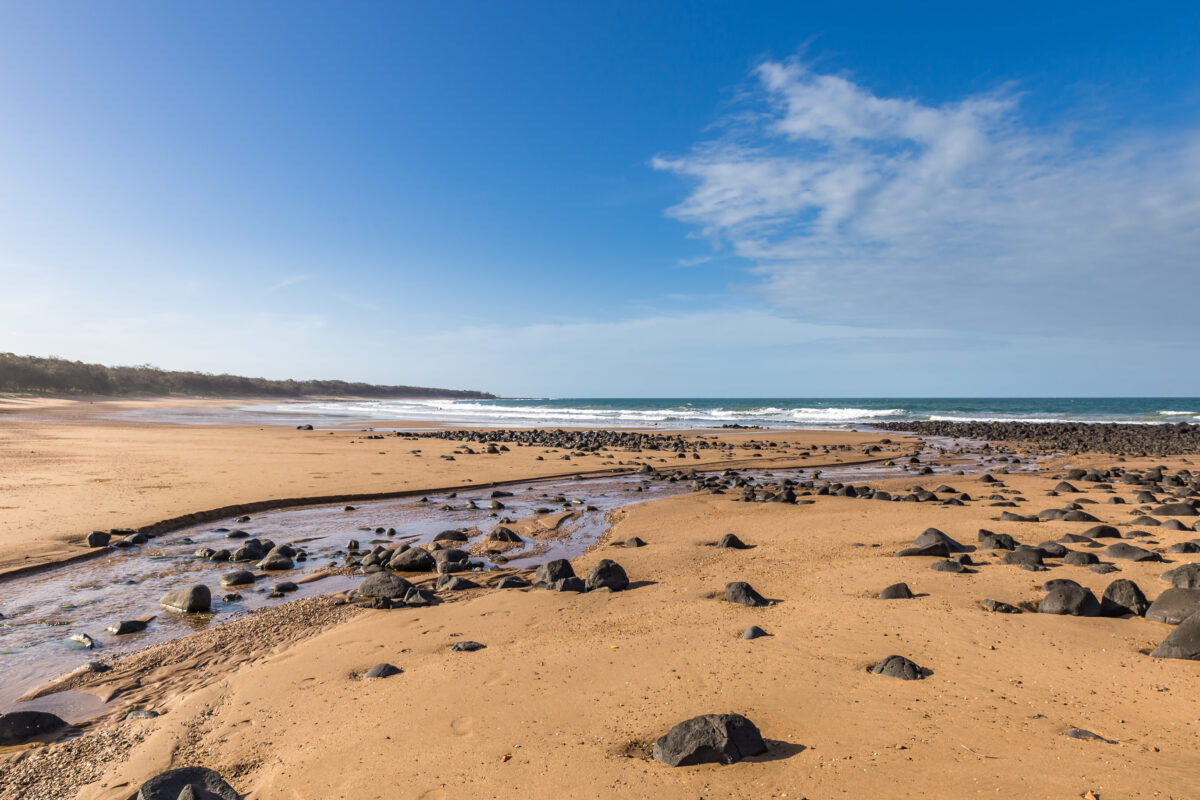 Beach with Sand and Small Rocks at Mon Repos Walking Track near Bundaberg, Queensland, Australia.