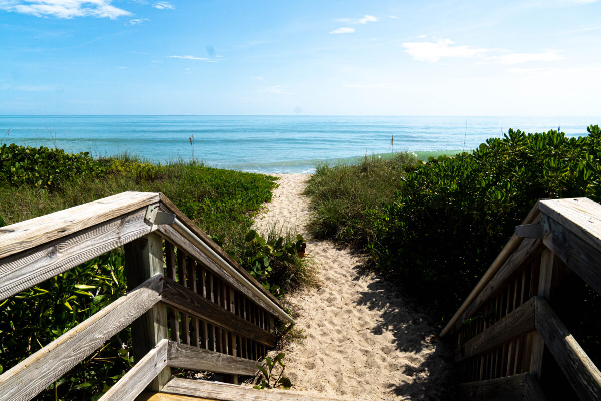 Wooden steps going down to beach, Herman's Bay Beach, Jensen Beach, Hutchinson Island, Florida.