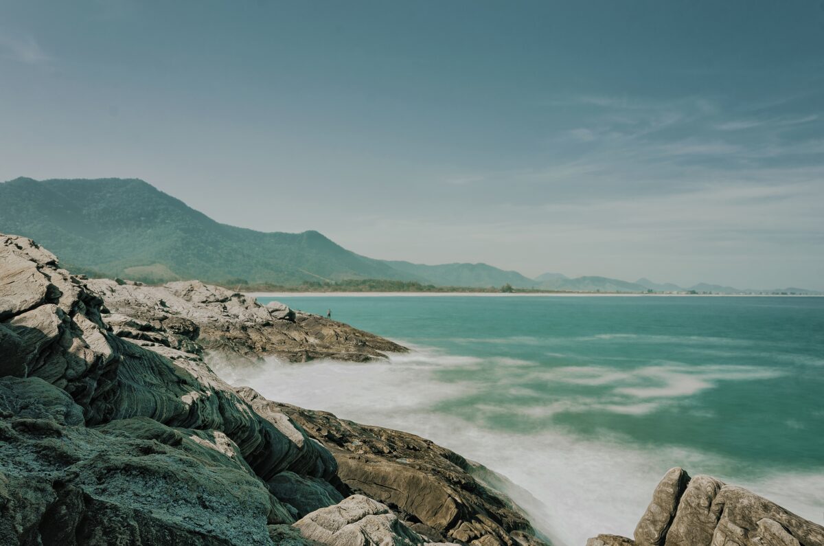 A high angle shot of the turquoise water of the Saquarema Beach in Rio de Janeiro.