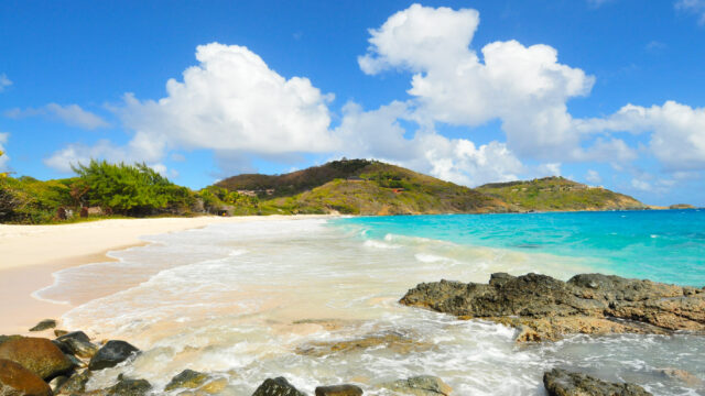 This Private Caribbean Island Is a Celeb Favorite—And You Can Actually Stay There