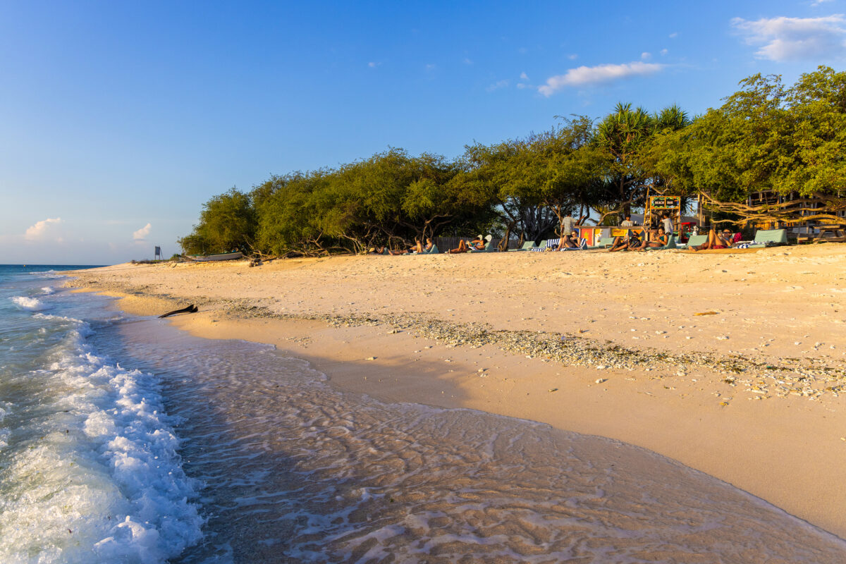 People on the beach in the evening, Gili Meno, Indonesia.