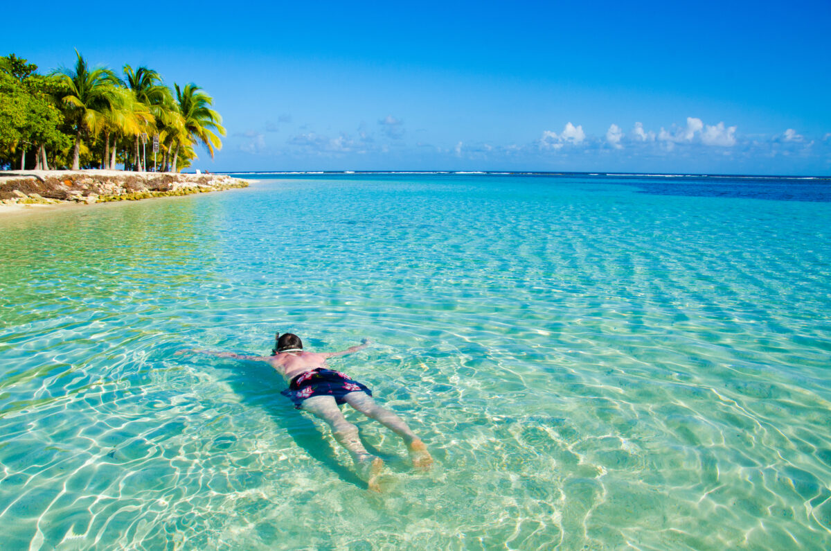 Snorkeling in Clear water on beautiful island.