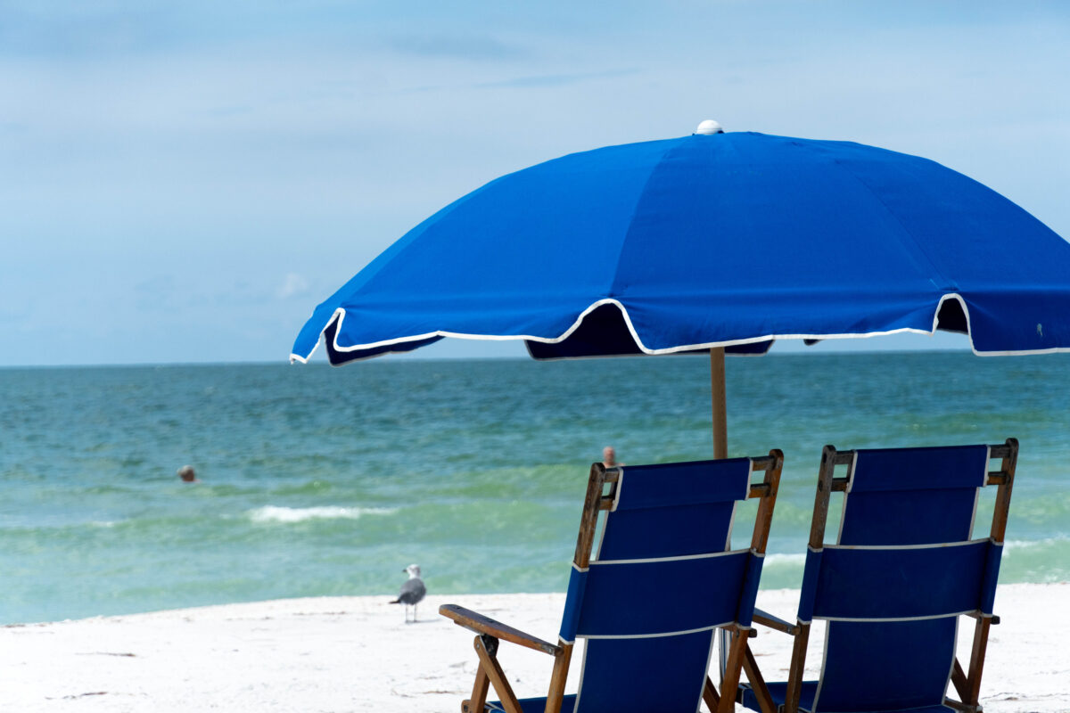 Chairs, water, bird, Caladesi Island Florida