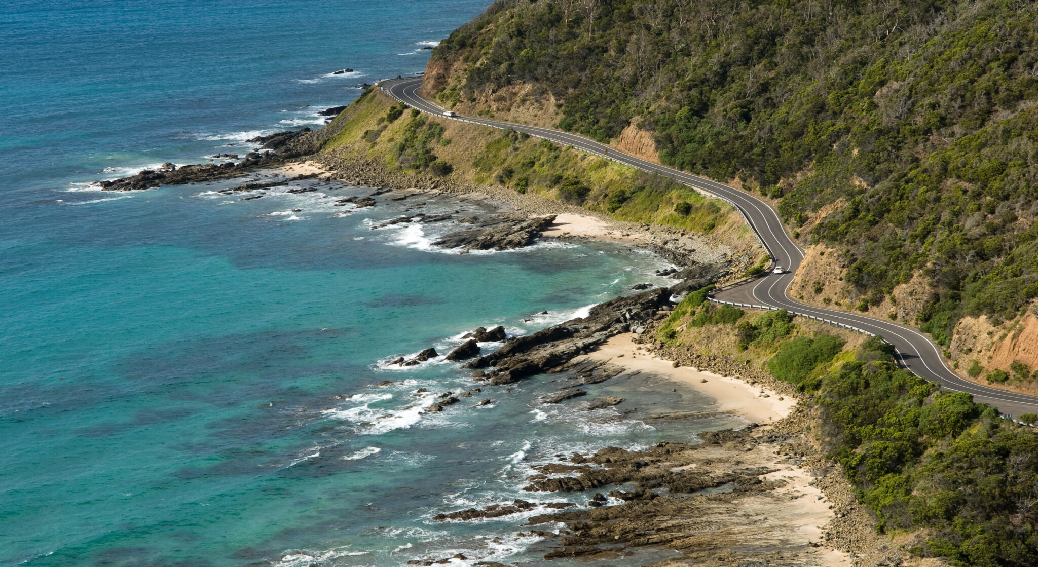 The World’s Most Spectacular Coastal Road Trips for Summer — and the Beaches to Stop At