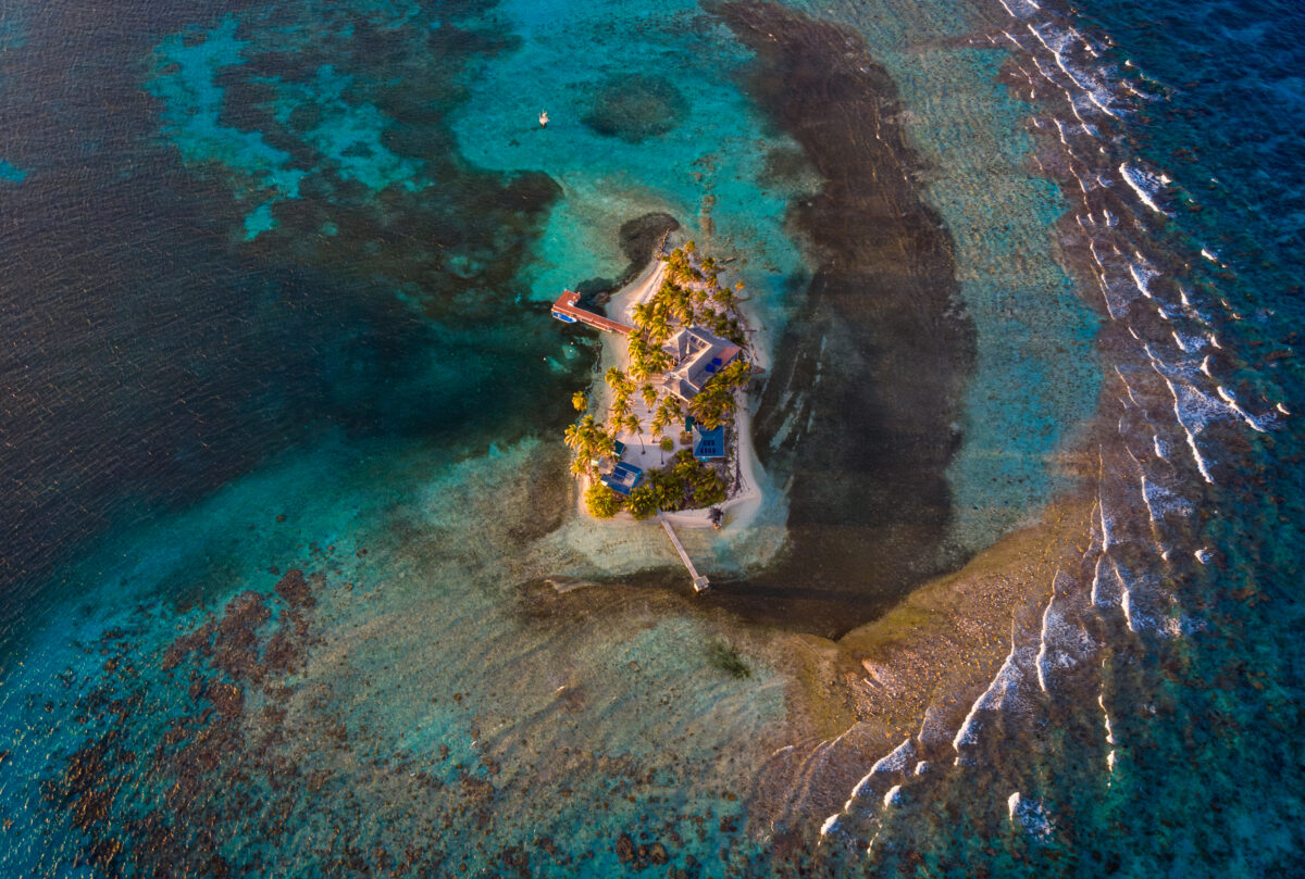 Carrie Bow nestled on the reef crest at dusk