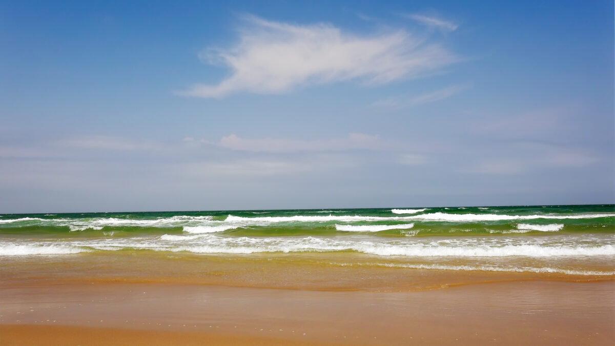 Ocean waves roll in from the Gulf of Mexico at Isla Blanca Park on South Padre Island in Texas