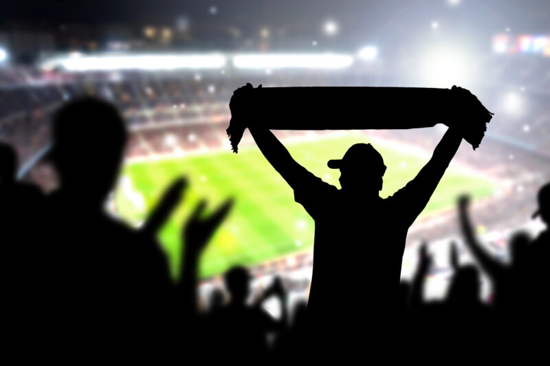 Crowd silhouette in a soccer stadium.