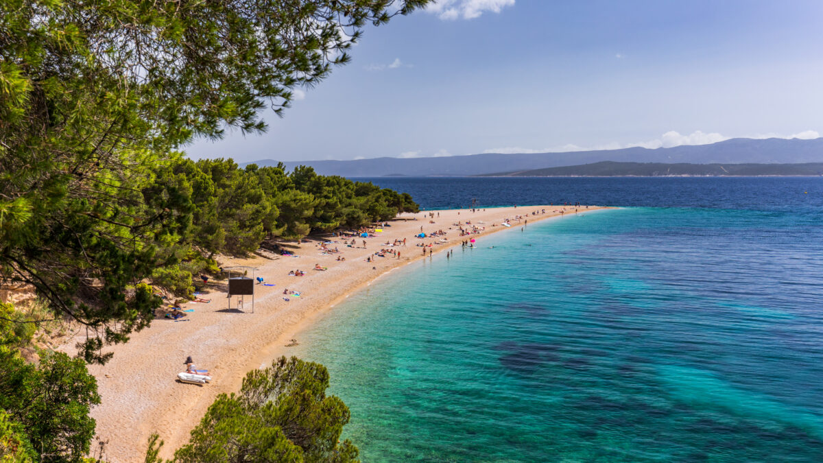 Zlatni Rat (Golden Cape or Golden Horn) famous turquoise beach in Bol town on Brac island, Dalmatia, Croatia. Zlatni Rat sandy beach at Bol on Brac island of Croatia in summertime