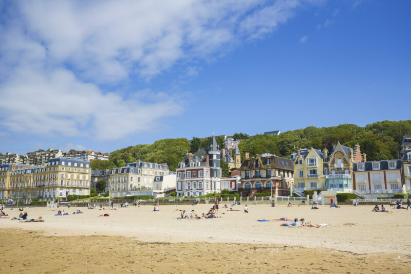 Trouville, Calvados, Normandy, France. The Beach at Trouville-Sur-Mer, Calvados department; Normandy, a famous tourist attraction in Northern France