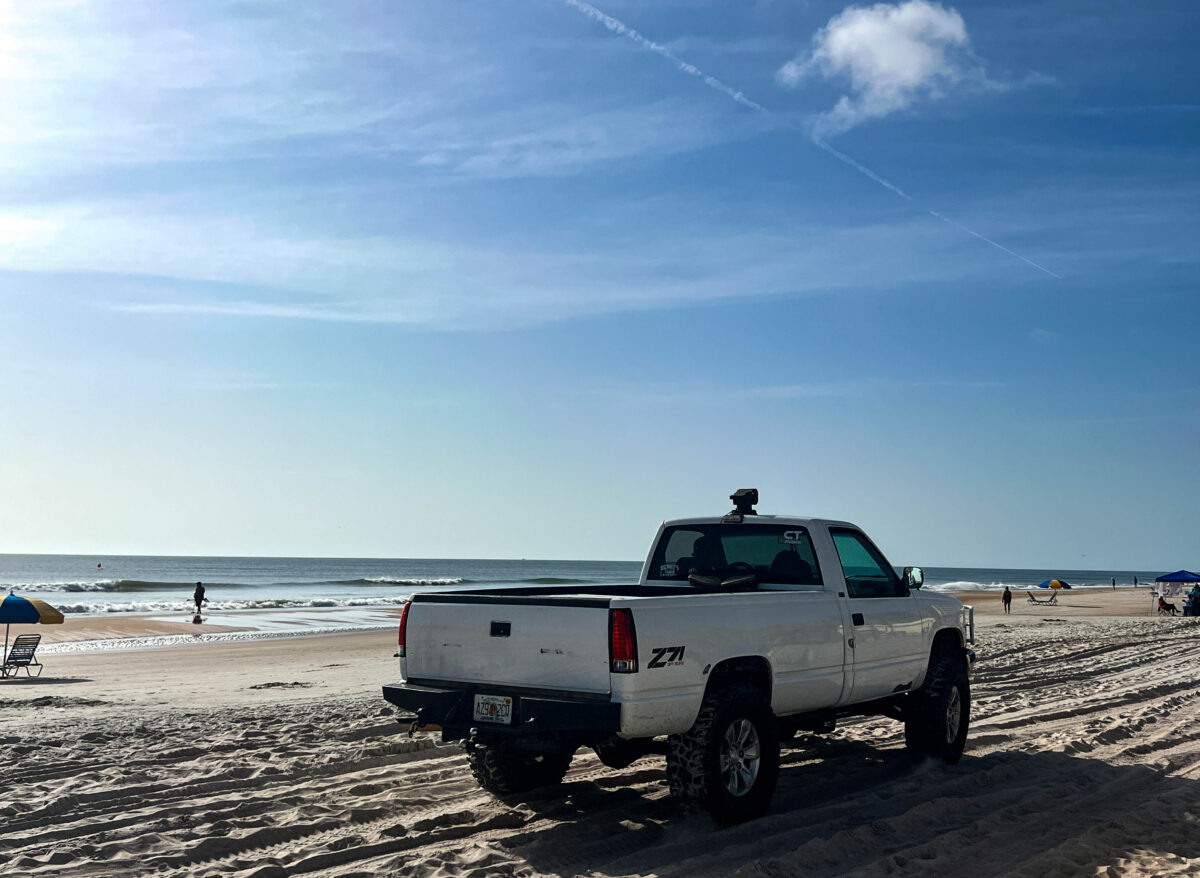 White Truck Driving on the Beach_Daytona Beach_Florida_Brandy Jo Hastings_